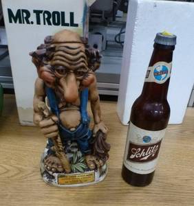 lot 63 image: Vintage Mr Troll bourbon decanter and Schlitz flashlight