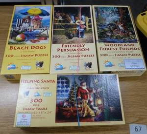 lot 67 image: FOUR 300 piece puzzles, large size and a box of puzzle sorter trays