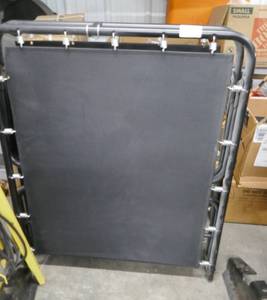 lot 147 image: Mother-in-law cot like New (must not have come over)