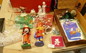 lot 151 image: Lot of Christmas nutcrackers, bells, boxes that pop out with 12 more small boxes, sleigh, bags