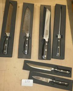 lot 173 image: FIVE kitchen knives and sharpener