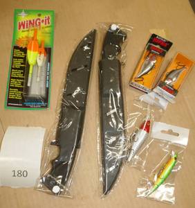 lot 180 image: Two new filet knives, lures and bobbers