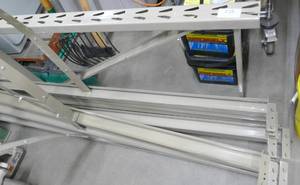 lot 218 image: Menards pallet racking, 8 beams(97 in), 1 8ft upright (2ft deep) and 16 pcs of wire decking