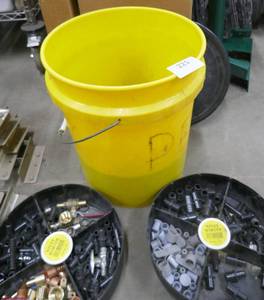 lot 221 image: Bucket full of Pex tubing parts