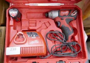 lot 239 image: Milwaukee drill and charger 12V