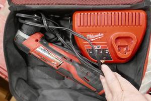 lot 242 image: Milwaukee right angle drill and charger 12V