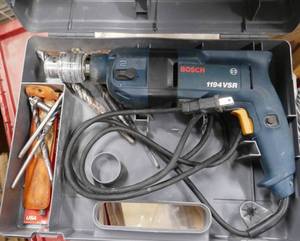 lot 243 image: Bosch corded drill with bits
