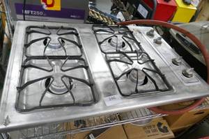 lot 246 image: 4-burner Magic Chef propane stove for camping outdoor