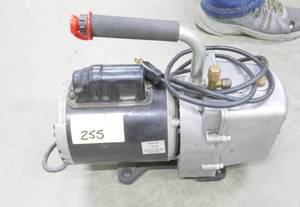 lot 255 image: Vacuum pump - works good