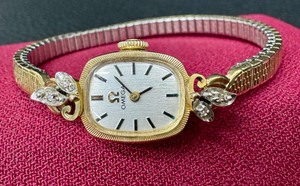 lot 4 image: Vintage Ladies 14k and Diamond Omega Watch