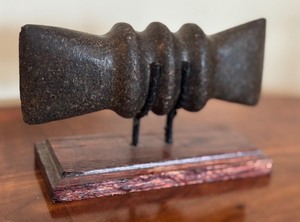 lot 177 image: Native American Artifact Double Headed Native American Ax Head on Stand