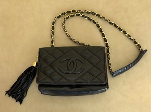 lot 388 image: Chanel Vintage Small Quilted Black Leather Cross Body Bag with Tassel