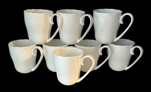 lot 65 image: Eight Nicole Miller Coffee Cups