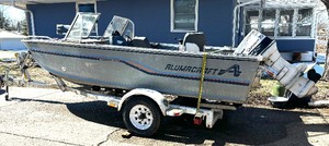 lot 1 image: 1987 Alumacraft Trophy 170 Boat with Shore Lander Trailer