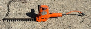 lot 153 image: Black & Decker 13 Inch Single Edge Scrub and Hedge Trimmer Model 8100