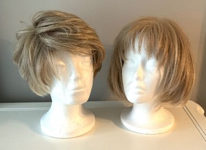 lot 79 image: Two Wigs including Raquel Welsh