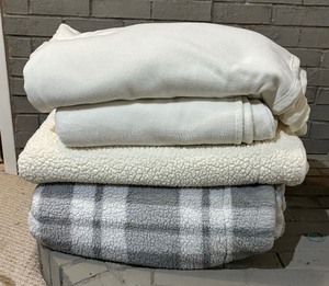 lot 322 image: Four Plush Blankets
