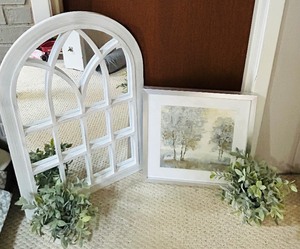 lot 384 image: Lovey Home Decor including Arched Mirror, Faux Plants and Framed Print