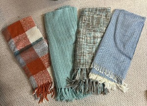 lot 405 image: Four Cozy Throw Blankets by Nido Notte, Cynthia Rowley, Calzeat of Scotland and Max Studio Home