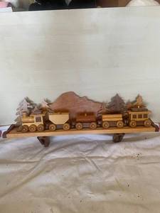 lot 6 image: Handcrafted Wooden Train on Decorative Shelf