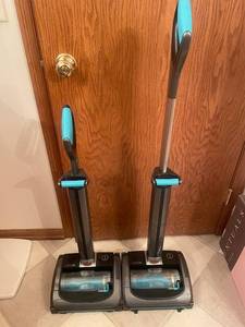 lot 9 image: Set of 2 Bissell Cordless Vacuums with Rechargable Batteries