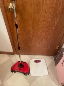 lot 10 image: Fuller Brush Co. Carpet Sweeper and Taylor Digital Bathroom Scale