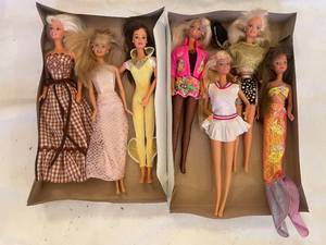 lot 51 image: Collection of 7 Vintage Barbie Dolls in Diverse Outfits