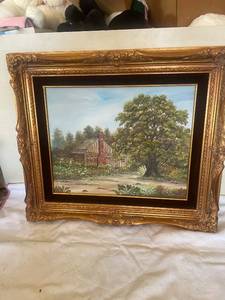 lot 87 image: Framed Oil Painting of a Rustic Cabin and Tree Landscape