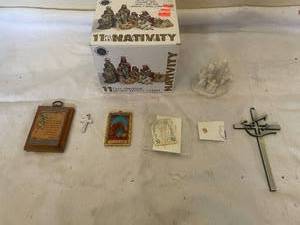 lot 93 image: 11-Piece Porcelain Antique Nativity Set with Religious Plaques and Crosses