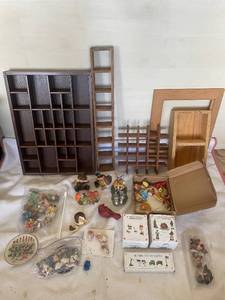 lot 95 image: Collection of Miniature Figures and Shelving Display Units