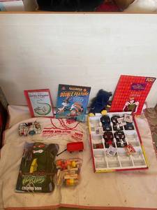 lot 102 image: Assorted Childrens Books, Toys, and Die-Cast Cars Collection