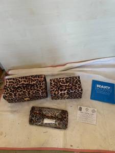 lot 217 image: Joy Mangano 3-Piece Leopard Print Cosmetic Cases with Medium and Roll-Up Organizer