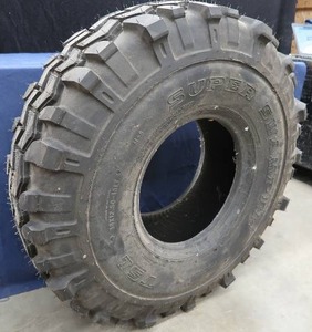 lot 34 image: BRAND NEW SUPER SWAMPER TIRE