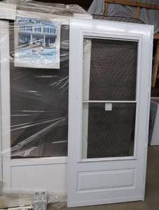 lot 40 image: TWO NEW SCREEN DOORS, ONE OUT OF BOX