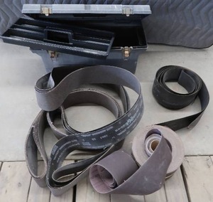 lot 78 image: HEAVY DUTY PLASTIC TOOL BOX WITH LARGE BELT SANDING PAPER