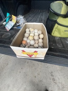 lot 15 image: box of old golf balls