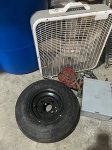 lot 32 image: Fan  Spare Tire Electrical Box