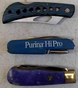 lot 30 image: Knives (1) Purina Hi Pro (1) Whitetail Cutlery (1) Frost Cutlery