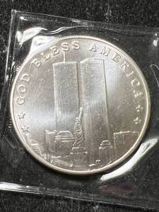 lot 24 image: 1 TROY OZ .999 FINE SILVER 911 ROUND