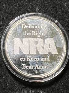 lot 74 image: 1 TROY OZ .999 FINE SILVER NRA ROUND IN AIRTITE
