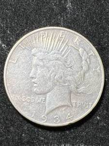 lot 84 image: 1934-D US PEACE SILVER DOLLAR XF