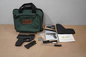 lot 21 image: Taurus PT709 Slim 9mm Semi-Auto Pistol - Crimson Trace Laser