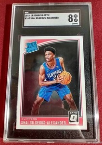 lot 130 image: 2018-19 Optic Shai Gilgeous-Alexander Rookie Card - SGC 8