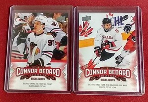 lot 240 image: (2) 2023-24 Upper Deck Connor Bedard Rookie Cards