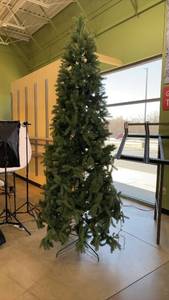 lot 51 image: 10ft Tall Artificial Christmas Tree with Stand