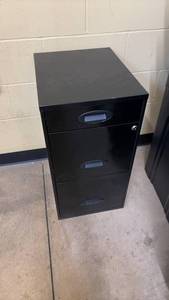 lot 62 image: Black Metal Three-Drawer Filing Cabinet with Lock Feature