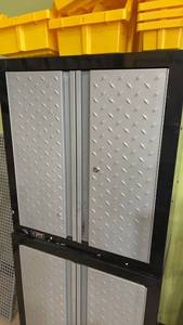 lot 65 image: Metal Storage Cabinet with Adjustable Shelves and Pegboard Sides