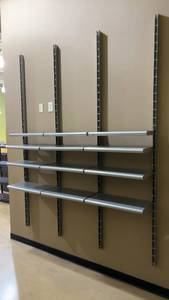 lot 34 image: OPTO Wall Mount Shelving System with Durable Steel Construction