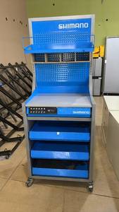 lot 82 image: Shimano Tech Center Work Bench with Pegboard and Storage