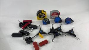 lot 848 image: Collection of Tape Measures and Tri-Socket Tools